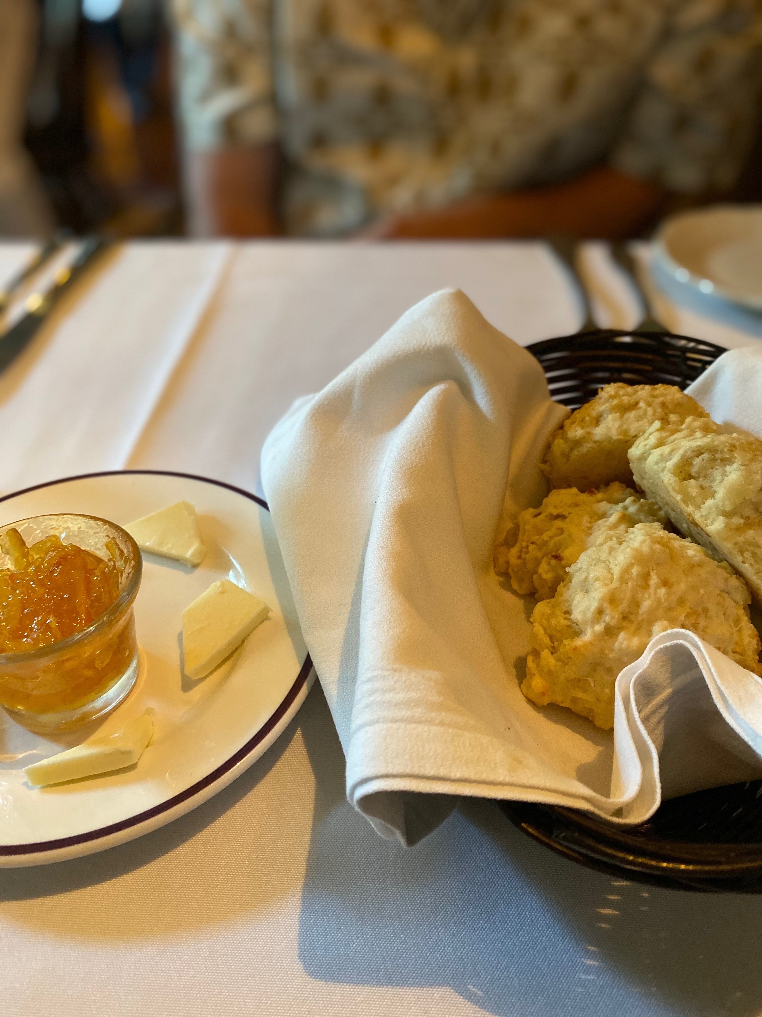 Here are our cheese biscuits, served with butter and marmalade. Because butter is not enough.